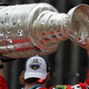 Image for article titled Stanley Cup Shot 11 Times During Chicago Blackhawks Victory Parade